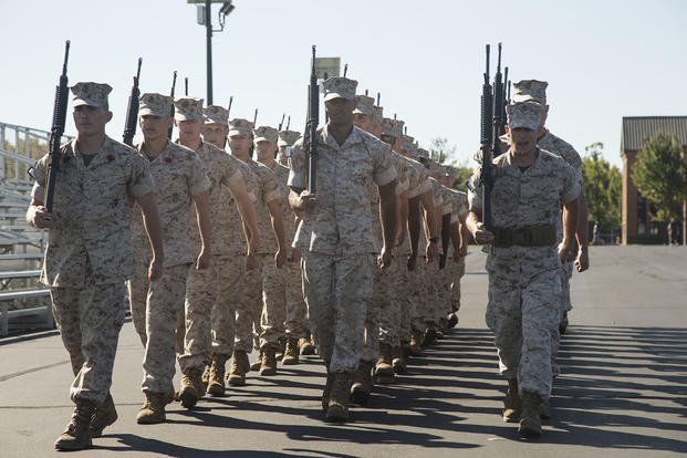 Marine officer candidates practice a close order drill.