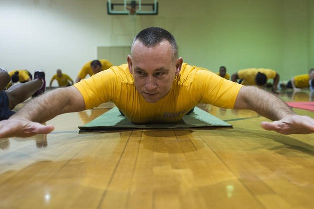 Navy sailor participates in physical training.