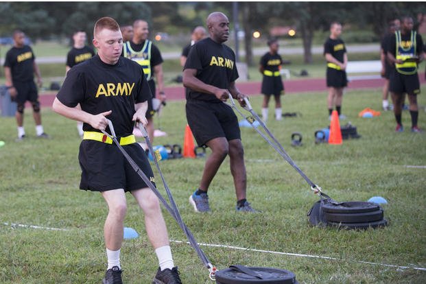 Pfc. Alex Colliver pulls a 90-pound sled 50 meters during a pilot for the Army combat fitness test.