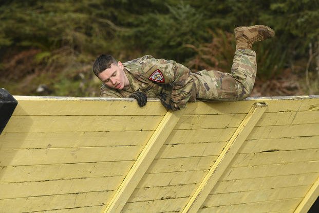 Soldiers navigate an obstacle course during the Army Best Warrior competition.