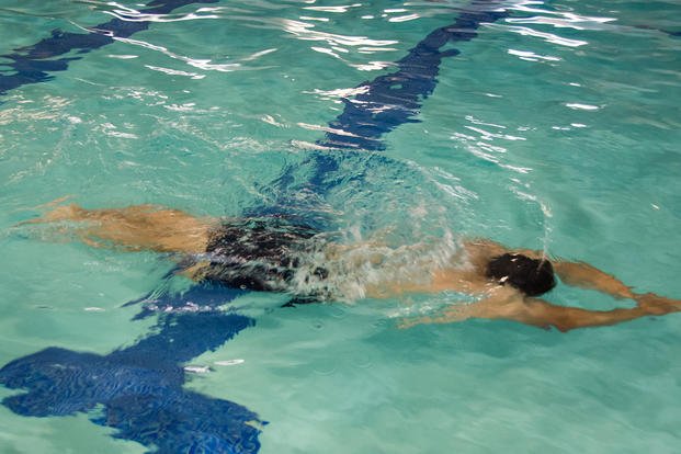 An Officer Candidate School student takes a swimming test.