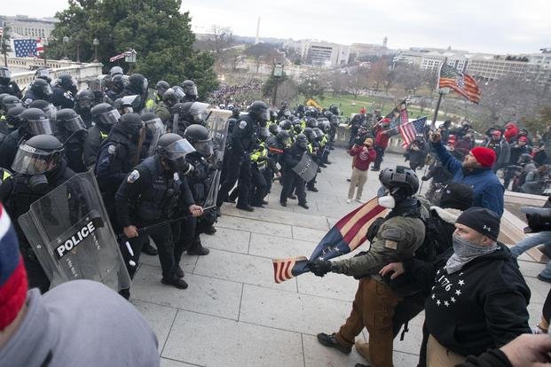 Capitol Police push back rioters who were trying to enter the U.S. Capitol