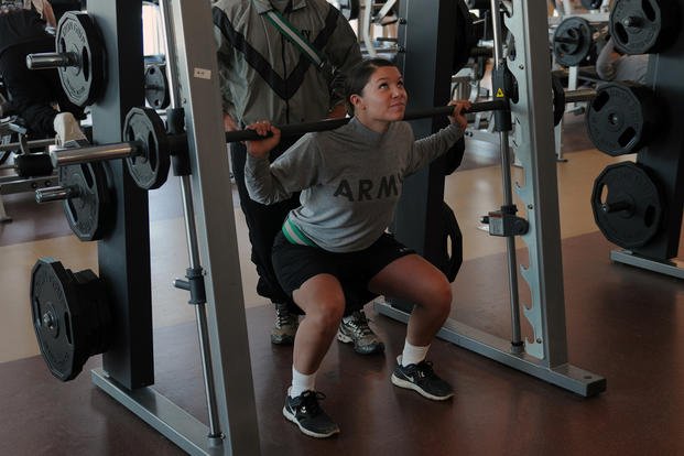 An Army soldier performs squats at Fort Carson.