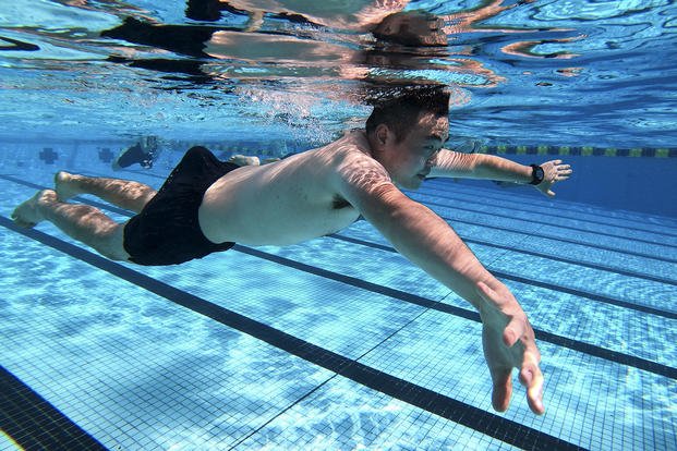 An ROTC midshipman swims during a swimming exercise.