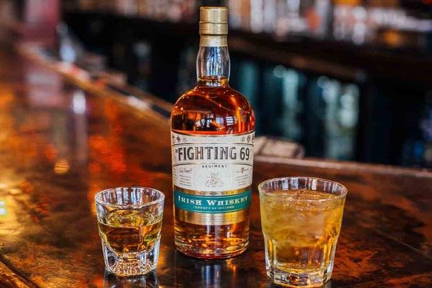 Fighting 69th Irish Whiskey bottle and glasses