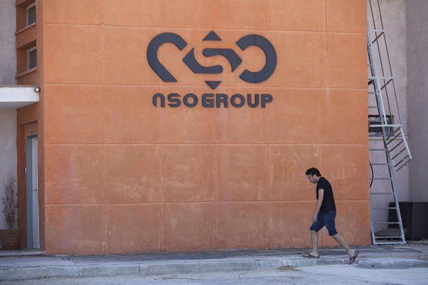 A logo adorns a wall on a branch of the Israeli NSO Group company.