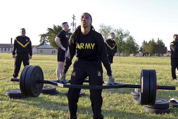 A soldier competes in a deadlift competition.