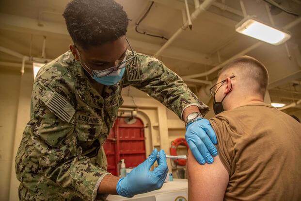 COVID-19 vaccination aboard the USS Gerald R. Ford