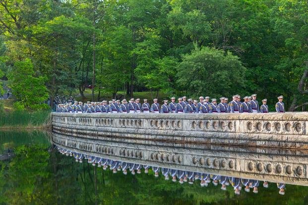 The graduating class of cadets march to the stadium for the graduation ceremony at the U.S. Military Academy at West Point, N.Y.