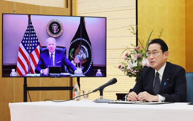 Japanese Prime Minister Fumio Kishida talks to President Biden on video conference.