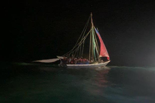An overloaded 60-foot Haitian sailing vessel Anguilla Cay, Bahamas