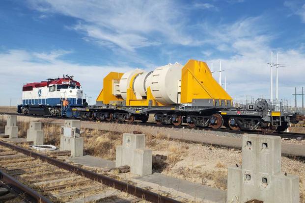 Atlas SNF railcar with test weights on test track.