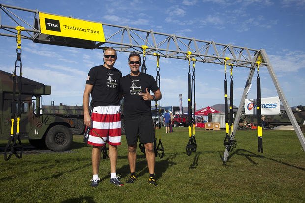 The heads of 24 Hour Fitness and TRX pose at The TRX Challenge in San Francisco.