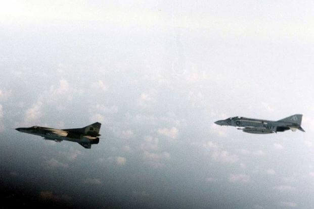 U.S. Navy F-4J Phantom II  escorts Libyan Mikoyan-Gurevich MiG-23