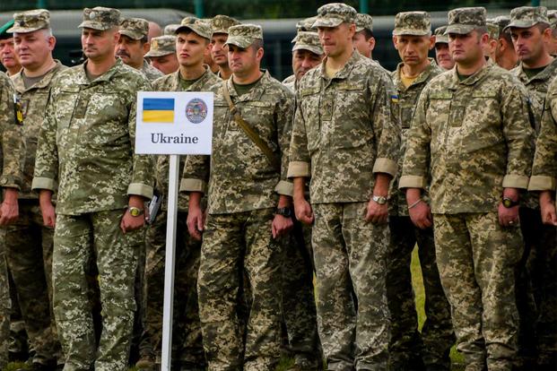Ukrainian troops stand in formation for the opening ceremony of Rapid Trident.