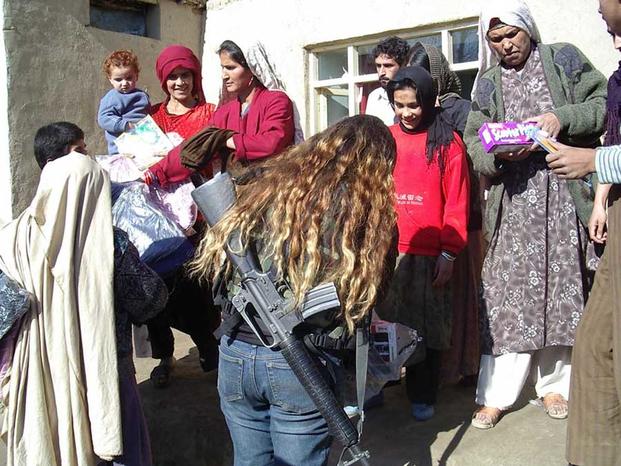 Elaine Little's team gives gifts to local Afghan women on Christmas in 2004.