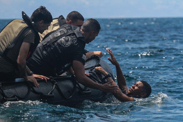 Soldiers simulate man overboard drills and emergency recoveries.