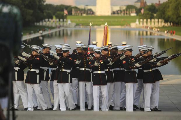 Marines march during a sunset parade in Washington, D.C.