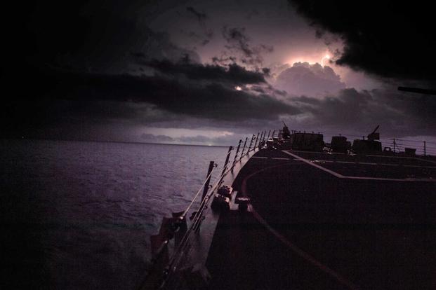 The guided-missile destroyer USS Farragut transits the Gulf of Oman.