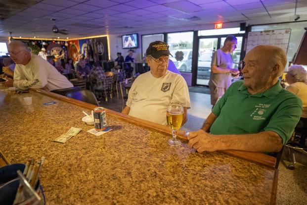 Mike Hadbavny talks with Post Commander Jim Barger at the VFW Post 445.