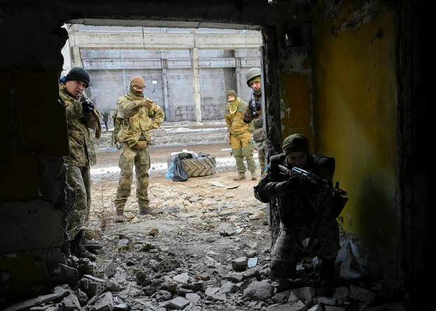 Belarusian volunteers receive military training in Kyiv.