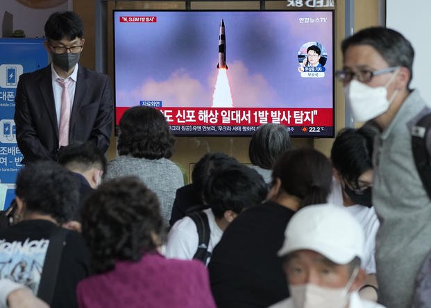 North Korea's missile launch during a news program at the Seoul Railway Station in Seoul