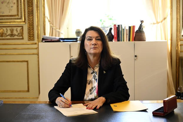 Swedish Minister of Foreígn Affairs Ann Linde as she signs Sweden's application for NATO membership