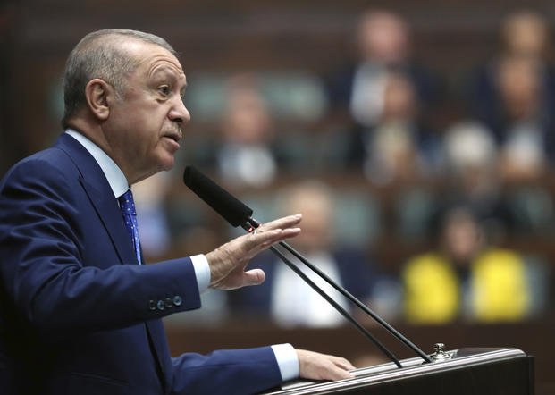 Turkish President Recep Tayyip Erdogan addresses his ruling party legislators, in Ankara, Turkey