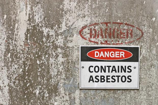 Placard indicating asbestos danger