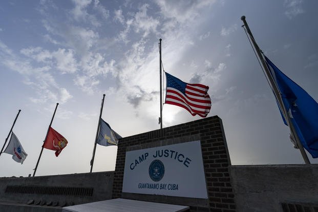 Flags fly at half-staff at Guantanamo Bay, Cuba.