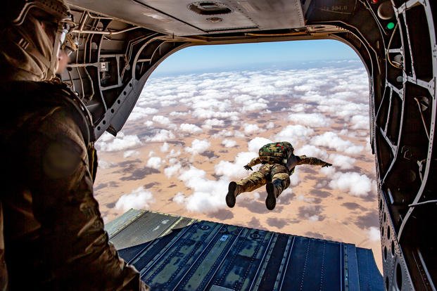 U.S. Army Special Forces and Royal Moroccan Special Operations jump from a CH-47 Chinook