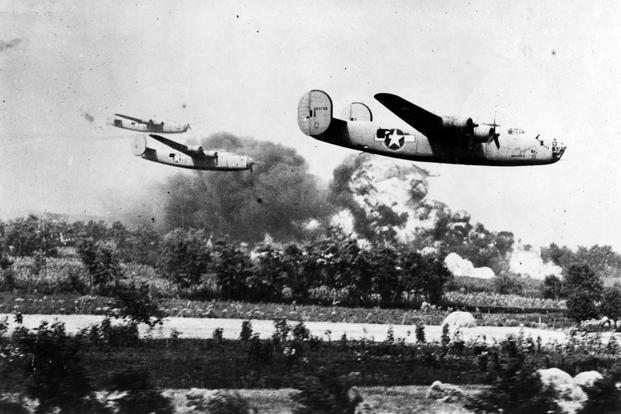 Three B-24 Liberators fly bombing mission in Romania in 1943.