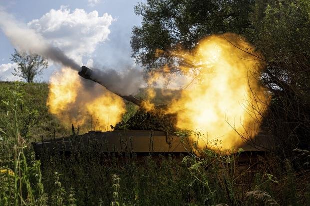Ukrainian self-propelled artillery shoots towards Russian forces at a frontline in Kharkiv region, Ukraine