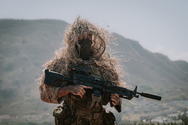 An Australian soldier participates in an amphibious raid with Marines during the Navy’s Rim of the Pacific (RIMPAC) exercise. 