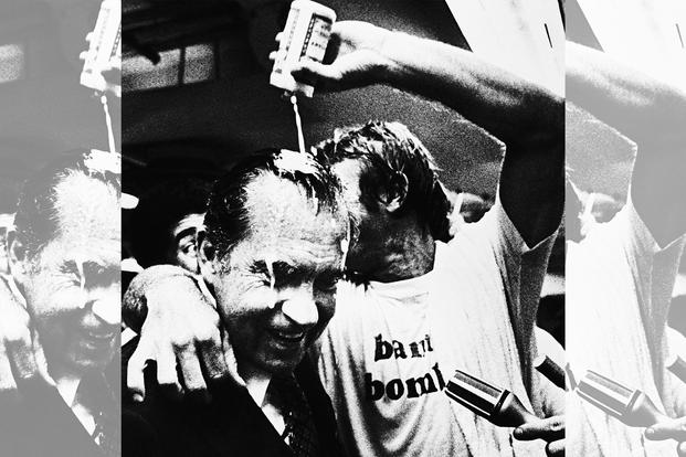 Former President Richard Nixon gets his share of the lockeroom celebration.