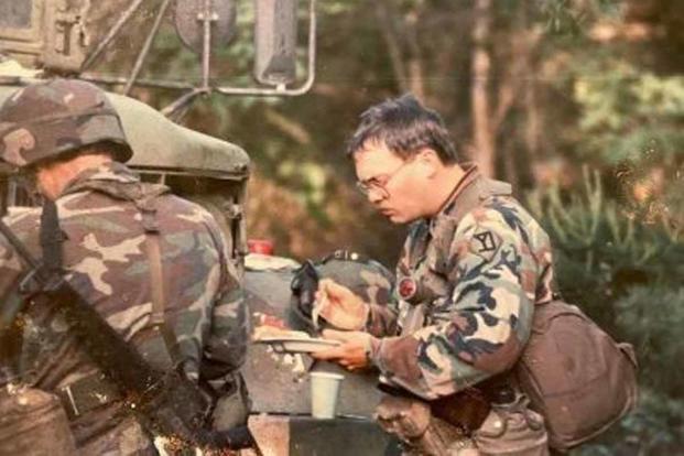 Greg Smith eating chow during field training in the “weekend warrior” era. (Photo courtesy of the author)