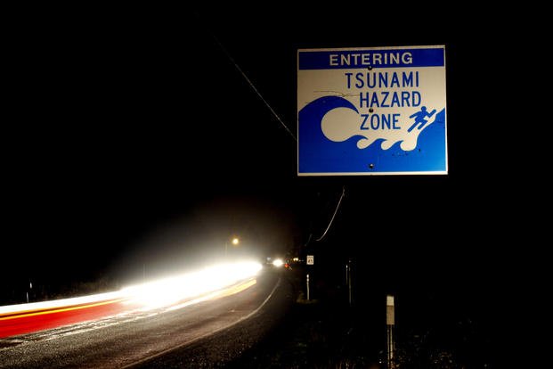 Residents evacuate Seaside, Ore., after the warning of a tsunami surge 