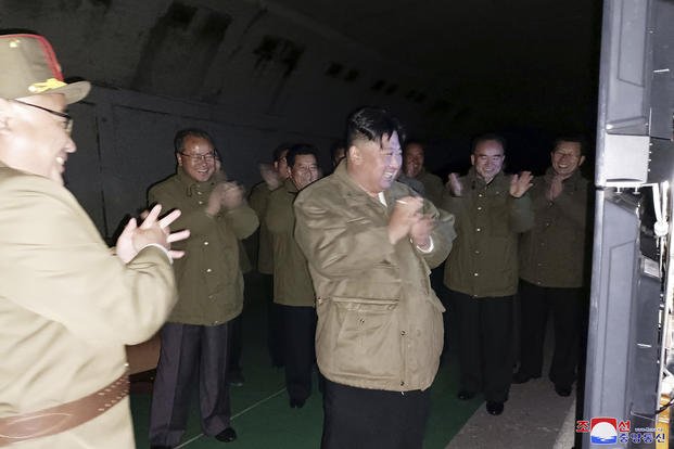  North Korean leader Kim Jong Un, center, supervises tests of long-range cruise missiles
