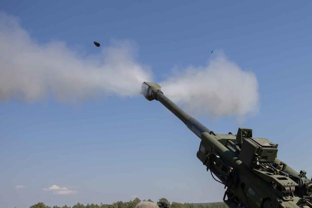 Marines fire an M777 howitzer during a training exercise at Fort Bragg.