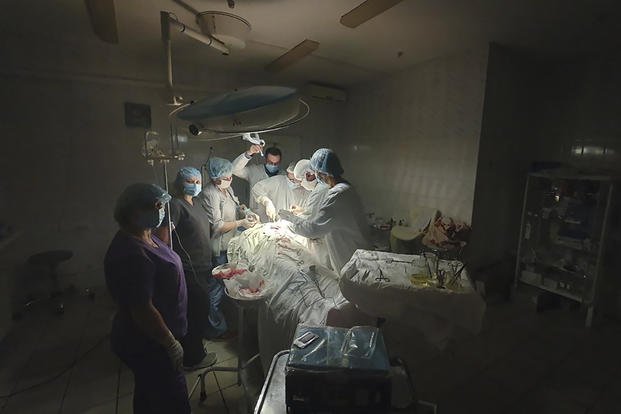 surgery on a bleeding patient at the hospital in western city of Lviv, Ukraine