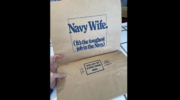 In the 1980s, Navy commissaries printed "Navy Wife. It's the Toughest Job in the Navy" on grocery bags.