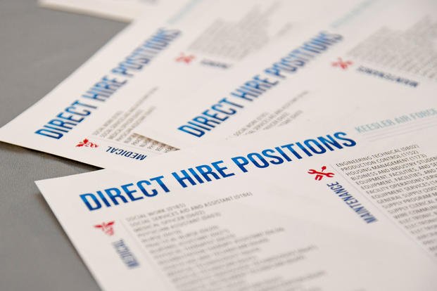 Educational flyers are displayed during the Keesler Job Fair at Keesler Air Force Base, Mississippi.