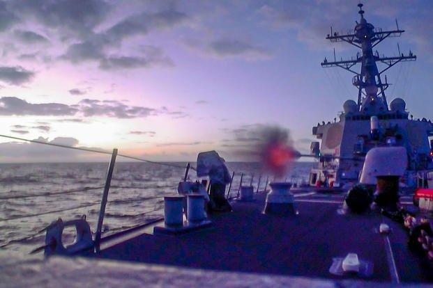 USS Benfold (DDG 65) conducts a 5-inch live-fire gunnery exercise, part of Keen Sword in the Philippine Sea