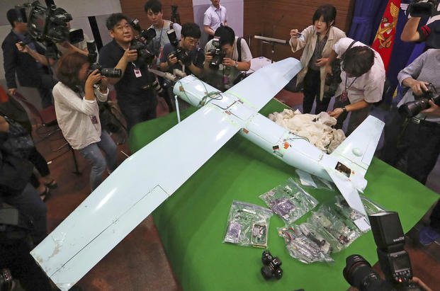 A suspected North Korean drone is inspected.
