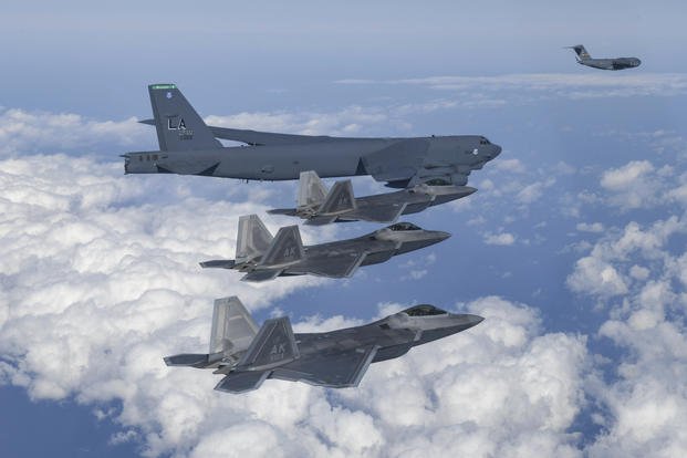 U.S. B-52 bomber, C-17 and South Korean Air Force F-35 fighter jets fly over the Korean Peninsula