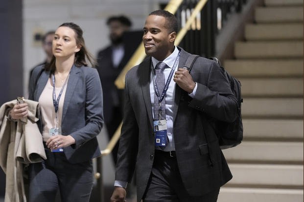 Rep.-elect John James, R-Mich., and other newly elected members of the House of Representatives arrive at the Capitol for an orientation program in Washington.