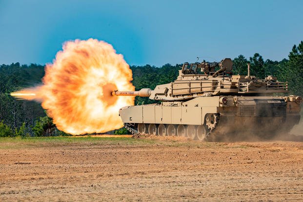 A U.S. M1A2 Abrams fires during the 2022 Sullivan Cup at the Army Armor School on Fort Benning, Ga.