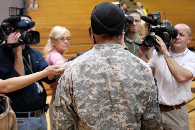 U.S. Army Capt. Tejdeep Singh Rattan speaks to journalists at a U.S. Army officer basic training graduation ceremony at Fort Sam Houston in San Antonio.