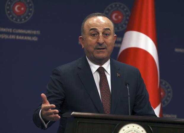 Turkish Foreign Minister Mevlut Cavusoglu speaks at a press conference in Ankara, Turkey