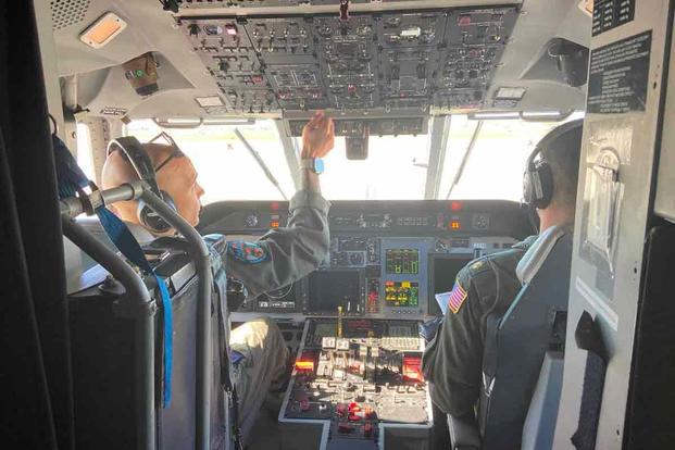 U.S. Coast Guard pilots Lt. Spencer Zwenger and Lt. Cmdr. Joshua Mitcheltree prepare their C-144 Ocean Sentry plane for a patrol over the Florida Straits Saturday, Jan. 14, 2023. (David Goodhue/Miami Herald/TNS) C-144 Ocean Sentry plane patrols over the Florida Straits.